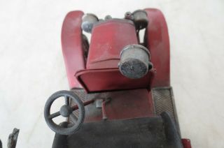 Vintage Model of an Antique Fire Truck made of cast metal and very detailed 7