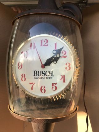 Vtg Busch Beer Hanging Rotating Clock/light.  24” Tall X 11” Wide