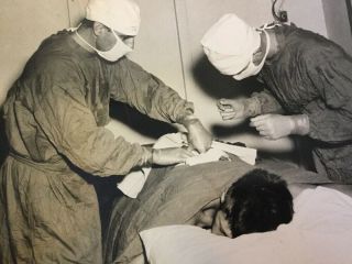 WW2 Era Official US Coast Guard Photo Fingers Of Mercy Navy Doctor Wounded Man 2