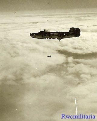 Org.  Photo: Aerial View B - 24 Bomber Dropping Bombs On Target