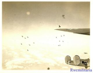 Org.  Photo: Aerial View B - 24 Bombers (44 - 49889) Flying Through German AA Flak 2