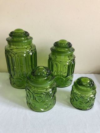 Set Of 4 Vintage L.  E Smith Green Glass Moon And Stars Canisters Jars With Lids