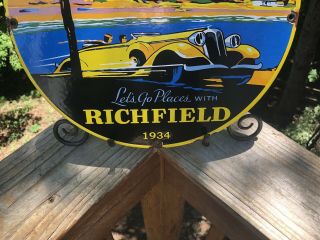 VINTAGE RICHFIELD LETS GO PLACES PORCELAIN GAS PUMP PLATE SIGN GARAGE CAN 1934 5