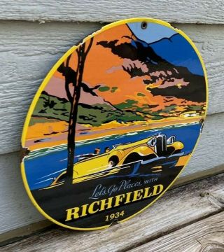 VINTAGE RICHFIELD LETS GO PLACES PORCELAIN GAS PUMP PLATE SIGN GARAGE CAN 1934 2