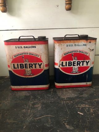 (2) Vintage 2 Gallon Oil Cans.  Liberty Oil.  Statue Of Liberty.  Red - White - Blue