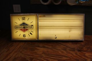 Vintage Briggs & Stratton Advertising Clock.  37 " X 13 " Lighted Clock