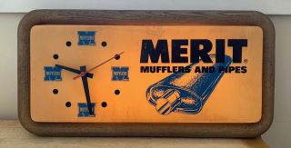 Vintage Merit Mufflers & Pipes Lighted Clock Automotive Advertising Sign 1983