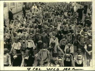 Press Photo Children & Adults On The Streets Wearing Gas Masks,  World War Ii