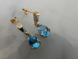 An Exceptional 9 Ct Gold Blue Topaz Drop Earrings