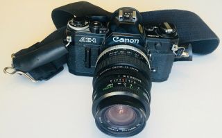 Canon Ae - 1 Vintage 35mm Film Camera,  Vivitar 28mm - 49mm Lens & 2x Teleconverter