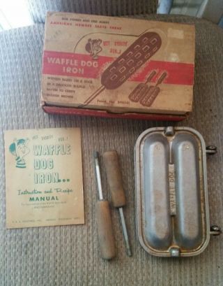 Vintage Antique Waffle Dog Iron Extremely Rare.  Cast Iron.