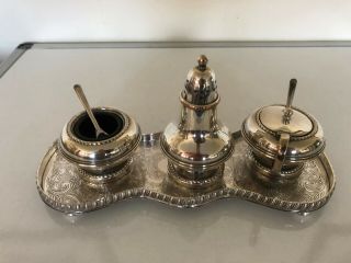 6 Piece Silver Plated Cruet Set On A Tray With A Chased Decoration