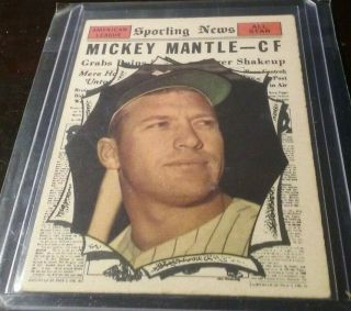 1961 Topps Sporting News 578 - Mickey Mantle (hof).  Vintage Vg - Ex.