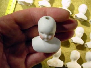 50 x excavated faded painted vintage bisque doll heads Germany Hertwig age 1890 11