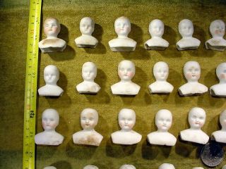 50 x excavated faded painted vintage bisque doll heads Germany Hertwig age 1890 2