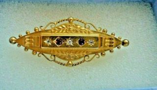 Victorian 15 Carat Gold Brooch Set With Rubies And Diamonds