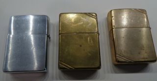 3 Vintage Zippo Lighters One Early One,  Commemorative 2