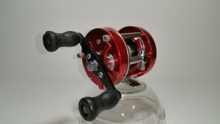 Red Abu Garcia Ambassadeur 5000 Vintage Reel