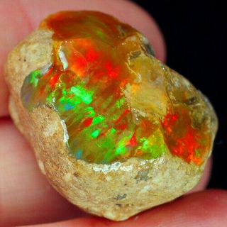 76.  6ct Natural Ethiopian Crystal Black Opal Play Of Color Rough Specimen Ysjg865