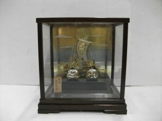 The God Of Wealth And Ebisu Of Virgin Silver.  Glasscase Of The Treasure Ship.