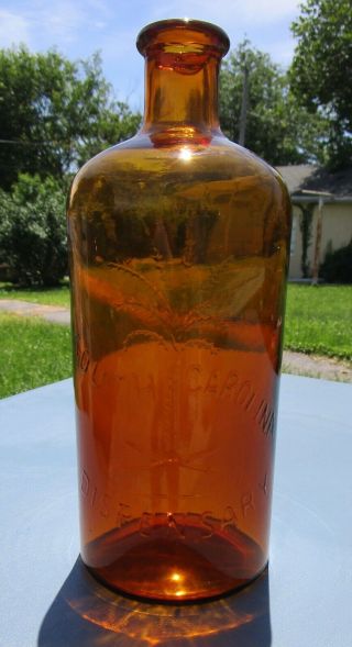 Vintage 1970s Amber South Carolina Dispensary Quart Palmetto Tree Bottle