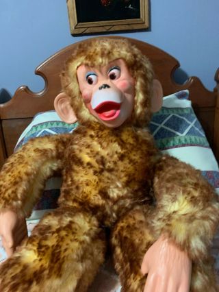 Description: vintage monkey,  plush stuffed,  blonde,  rubber face,  ears,  hands,  an 2