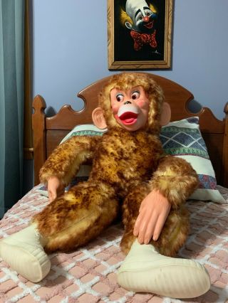 Description: vintage monkey,  plush stuffed,  blonde,  rubber face,  ears,  hands,  an 3