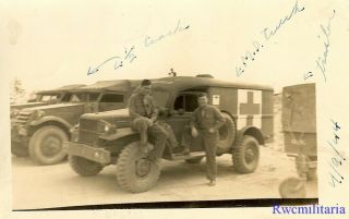 Port.  Photo: Good View Us Soldiers W/ Ambulance By M3 Armored Halftracks