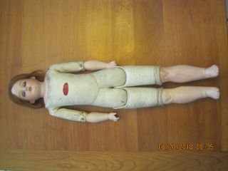 Antique Bisque Doll,  Leather Body,  Human Hair,  Jointed,  Eyes Open & Shut