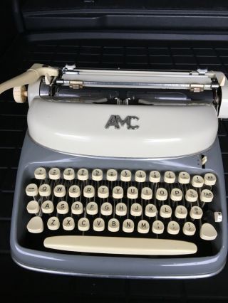 , Vintage Amc,  (alpina) Typewriter.  Made In Germany.  Grey And Creme.