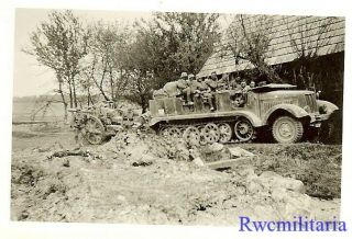 Wehrmacht Troops In Sdkfz Halftrack Towing 10.  5cm Artillery Gun