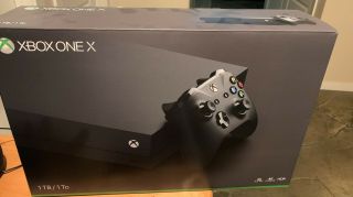 Xbox One X 1TB 4K Ultra HD Blu - ray Console - Looks,  rarely console. 8