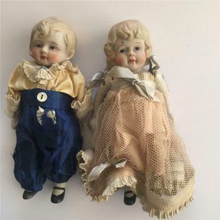 Antique Jointed Bisque Dolls - Boy And Girl Dressed In Silk