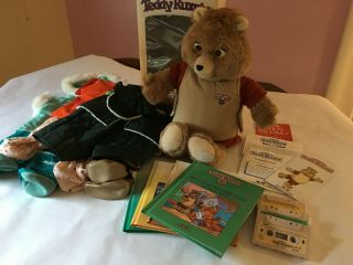 Vintage 1985 Wow Teddy Ruxpin W/ 3 Cassette Tapes,  4 Books,  & 3 Outfits