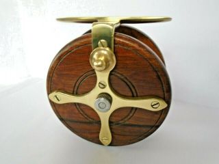 A ANTIQUE WOOD AND BRASS STARBACK FISHING REEL BY S.  ALLCOCK OF REDDITCH 6