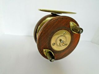 A ANTIQUE WOOD AND BRASS STARBACK FISHING REEL BY S.  ALLCOCK OF REDDITCH 7