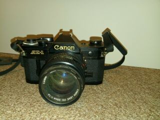 Camera With Strap Canon Ae - 1 Program Black Lens Fd 50mm 1:1.  4 Vintage 2308004