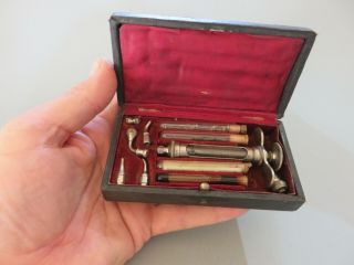 VINTAGE ANTIQUE MEDICAL INSTRUMENT DENTAL SYRINGE IN CASE 4