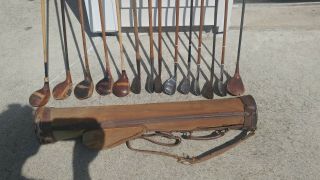 Antique Wood And Other Shaft Golf Clubs And Vintage Stovepipe Bag Has Large Tear