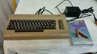 Vintage Commodore 64 Computer W/ Power Supply In Users Guide