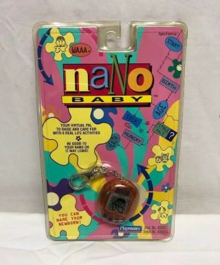 Orange Nano Baby Pet Virtual Playmates Vintage 1997