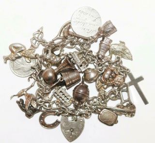 7.  25 " Loaded Vintage Sterling Silver Padlock Charm Bracelet,  25 Charms,  Moving