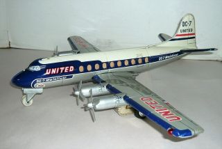 Rare Vintage Tin Japan United Airlines Dc - 7 Mainliner Toy Jet Airplane