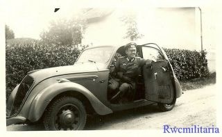 Port.  Photo: Rare Wehrmacht Officer W/ Impressed French Peugeot 202 Staff Car