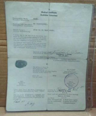 Orig 1945 German?? U.  S.  ?? Certificate Of Discharge/medical Certificate.