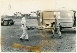 Org Wwii Photo: American Gi’s Loading Wounded Soldier On Medical Jeep