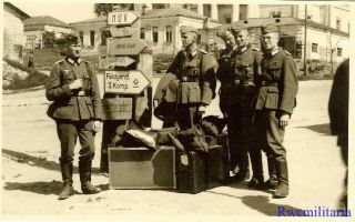 Port.  Photo: Wehrmacht Soldiers On Street By Unit Signpost W/ Luggage