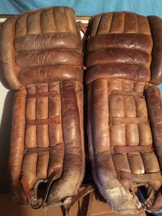 VINTAGE LEATHER AND HORSE HIDE HOCKEY GOALIE LEG PADS AND GLOVES. 2