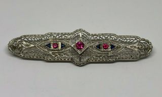 Estate/Vintage 14kt White Gold Brooch with Red and Blue Stones,  6.  4 gms,  2.  75 