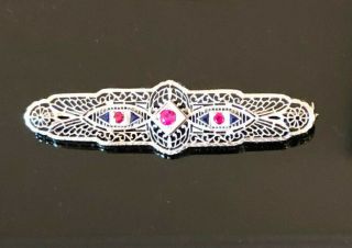 Estate/Vintage 14kt White Gold Brooch with Red and Blue Stones,  6.  4 gms,  2.  75 